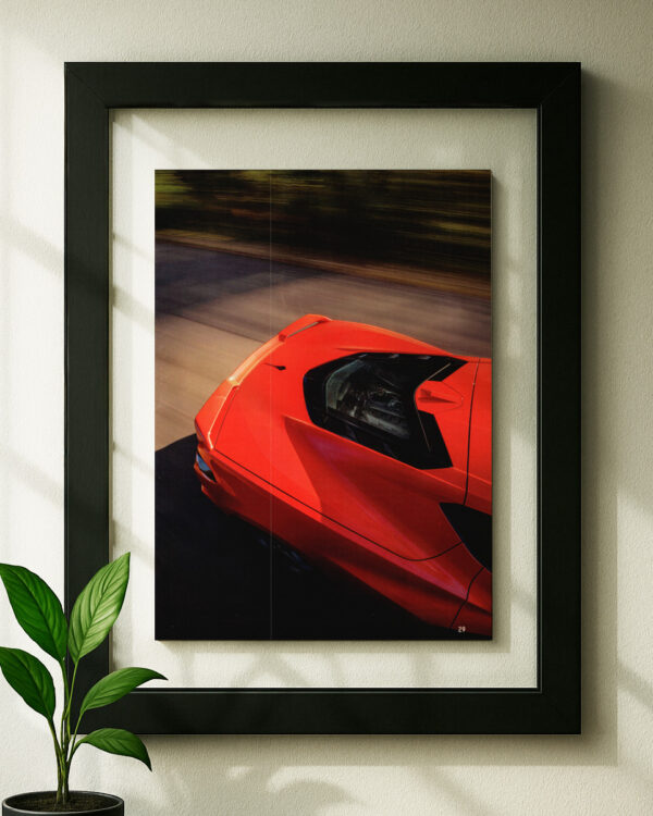C8 Corvette framed original ad in black floating frame on wall