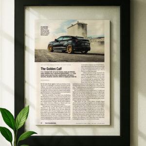 Framed original lamborghini urus ad in black floating frame on wall