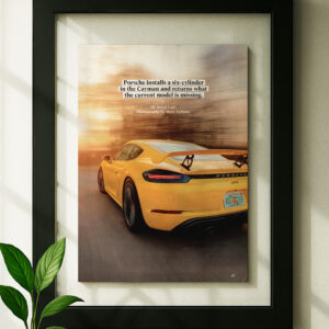 Framed Porsche 718 cayman gt4 original ad in black floating frame on wall