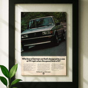 VW Jetta framed original ad in black floating frame on wall