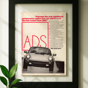 porsche 911 framed original ad in black floating frame on wall