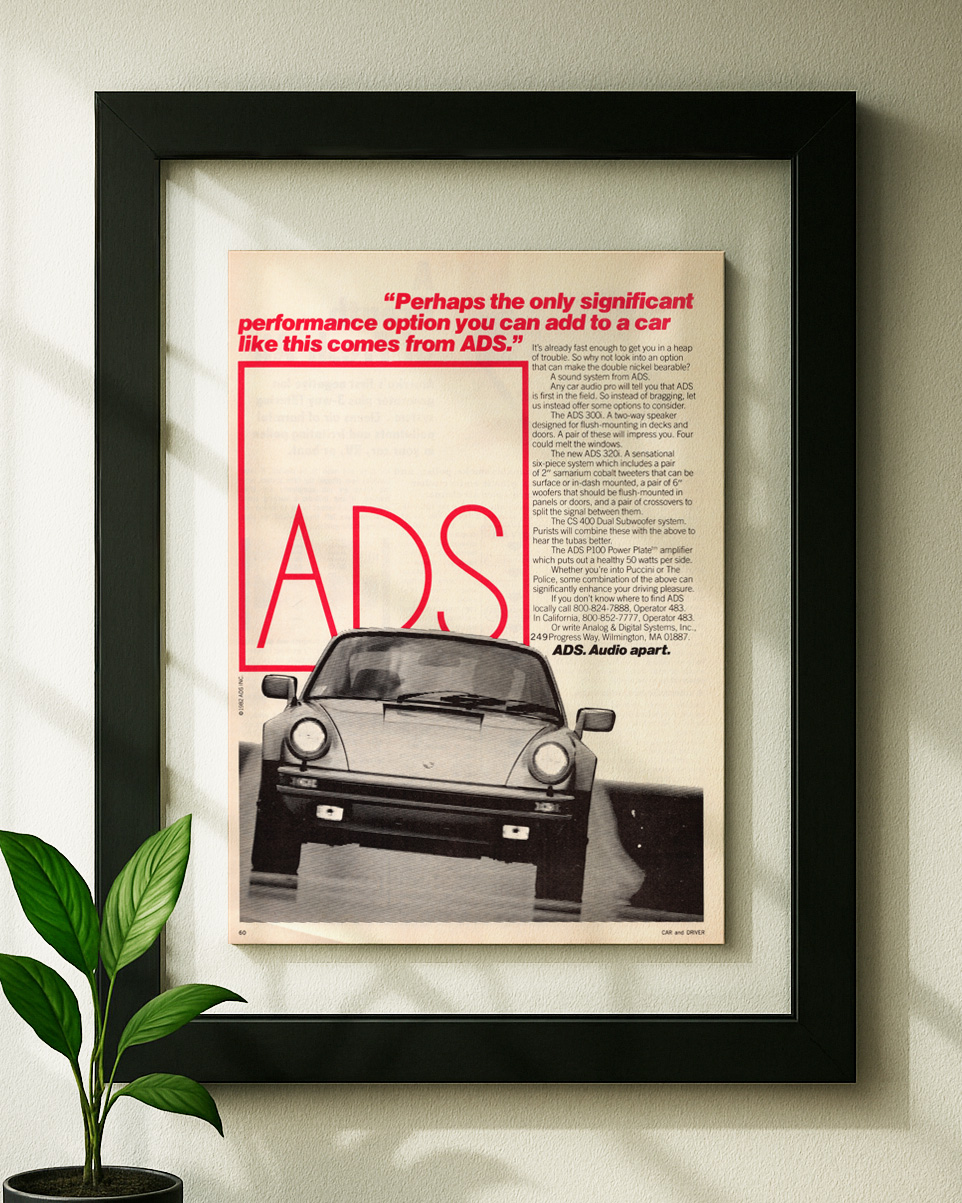 porsche 911 framed original ad in black floating frame on wall