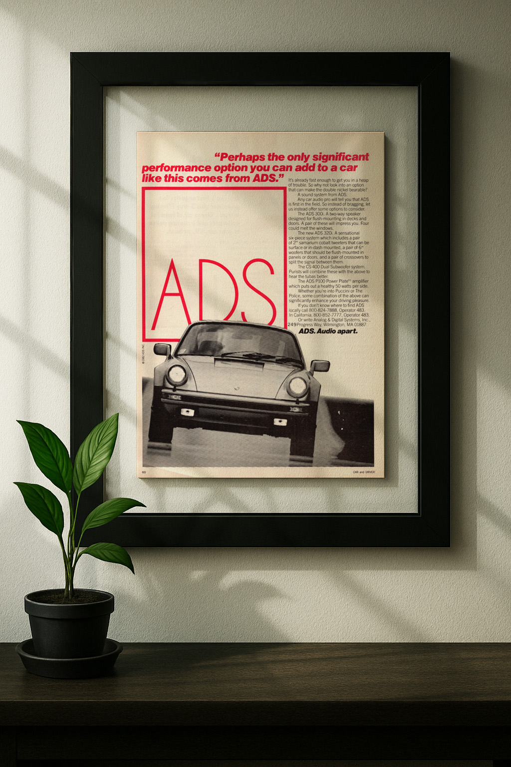 Porsche 911 ADS framed original ad in black floating frame on wall