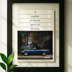 miata mx-5 framed original ad in black floating frame on wall