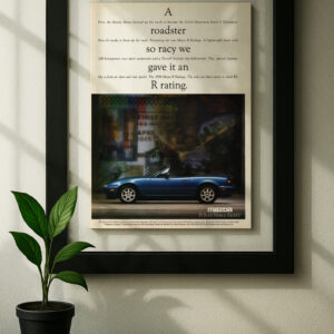 miata framed original ad in black floating frame on wall