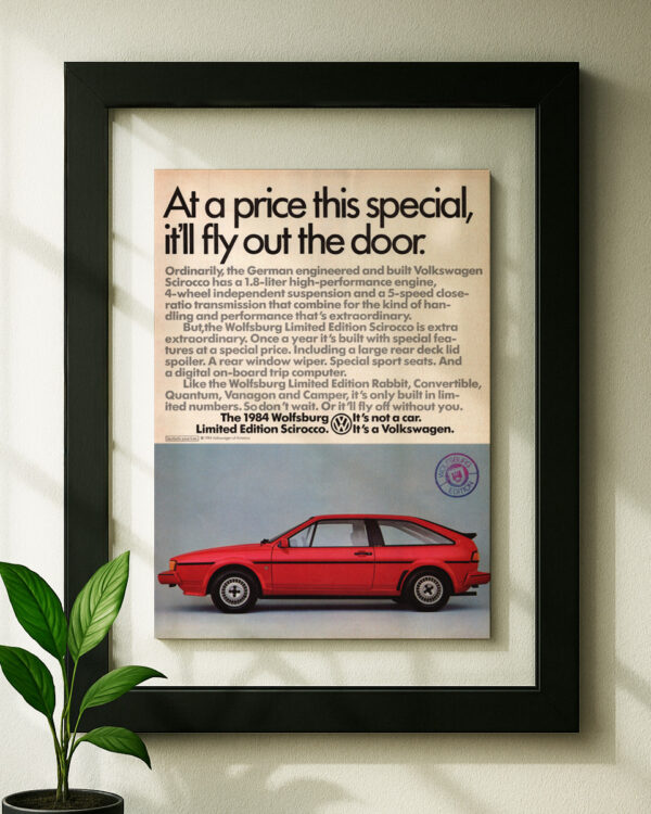 VW Scirocco Wolfsburg framed original ad in black floating frame on wall