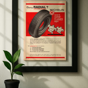 michelin x framed original ad in black floating frame on wall