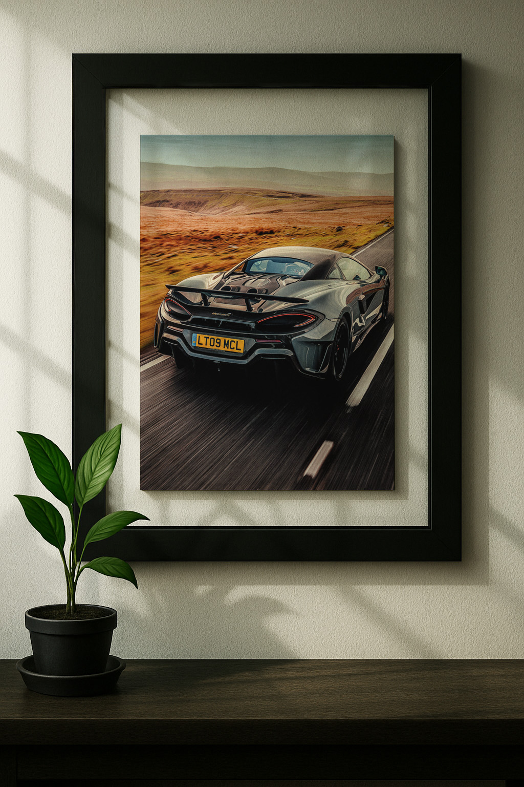 mclaren 600 lt framed original ad in black floating frame on wall