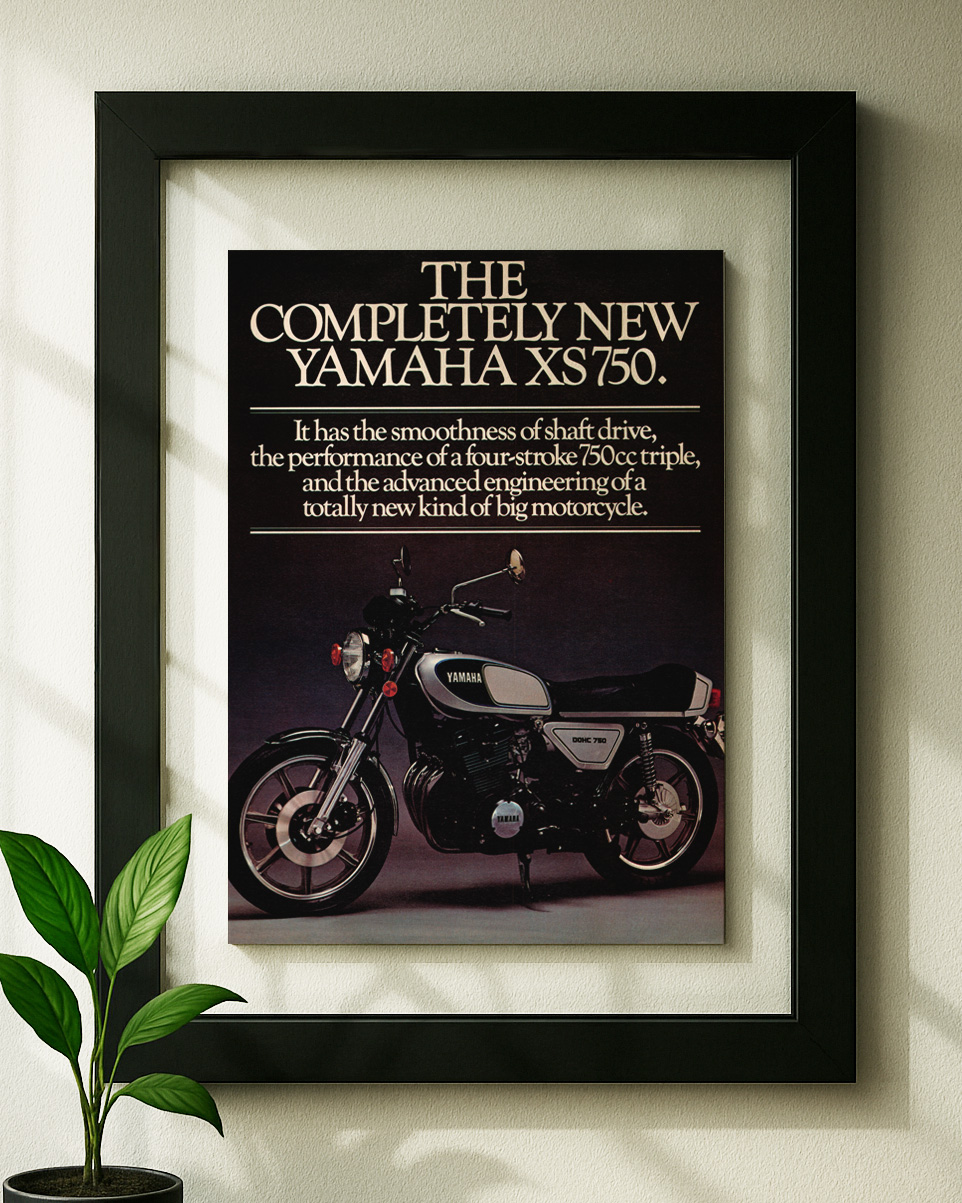 Yamaha XS750 framed original ad in black floating frame on wall