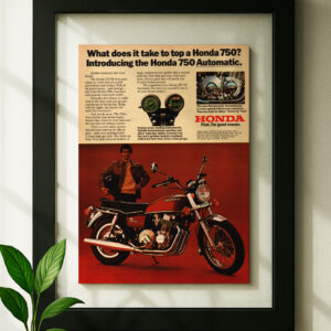 Honda CB750 framed original ad in black floating frame on wall