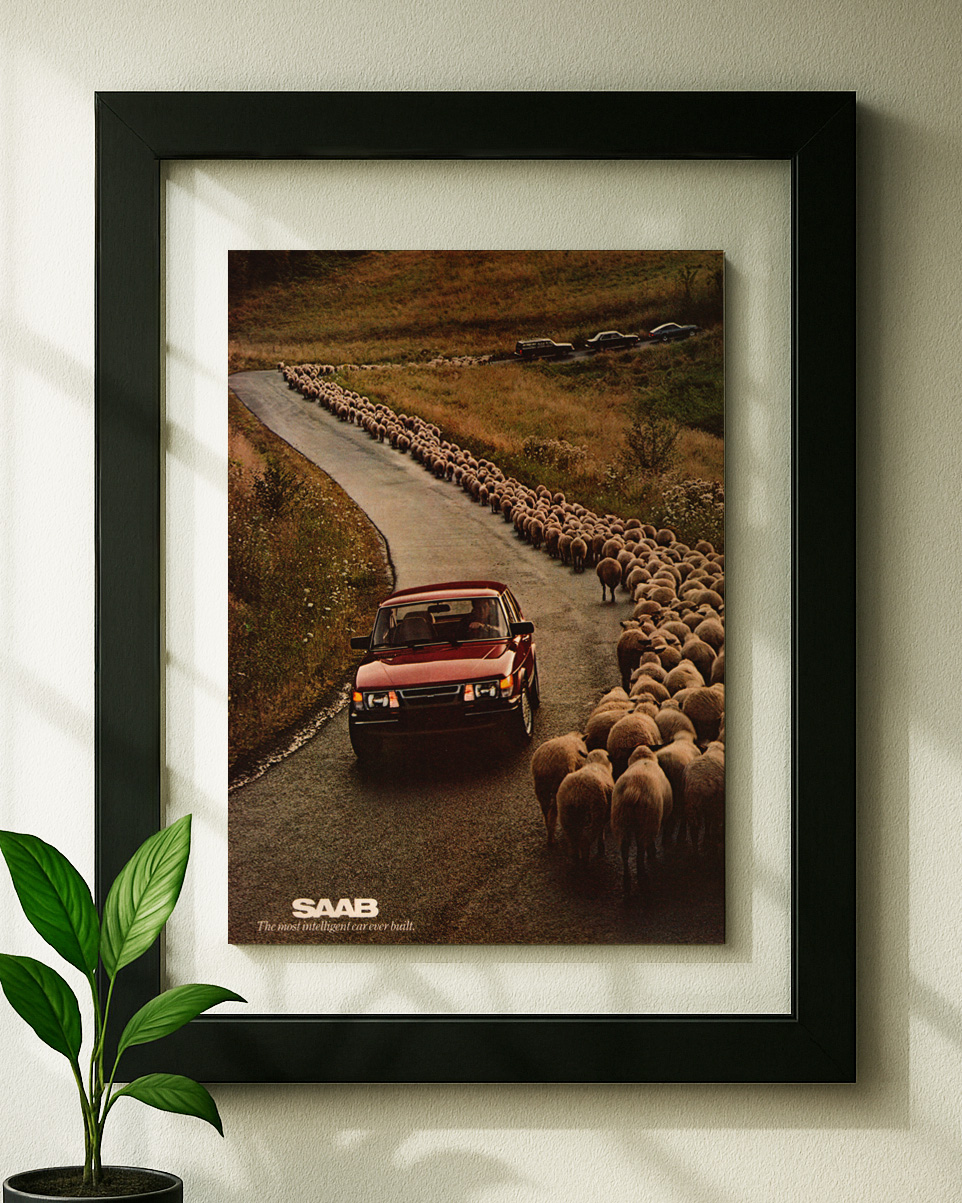 saab 900 turbo framed original ad in black floating frame on wall