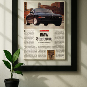 e31 bmw framed original ad in black floating frame on wall