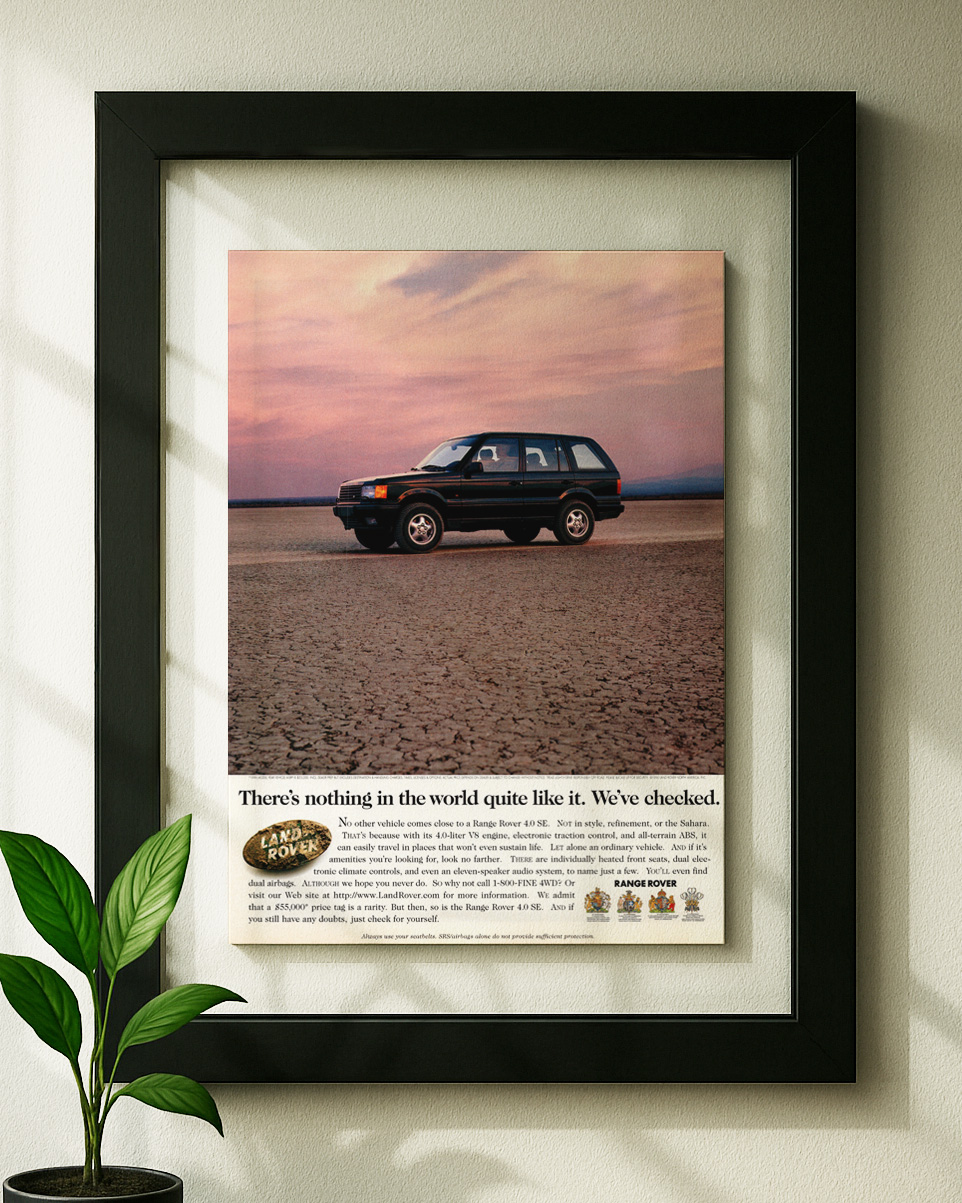 land rover 4.0 framed original ad in black floating frame on wall