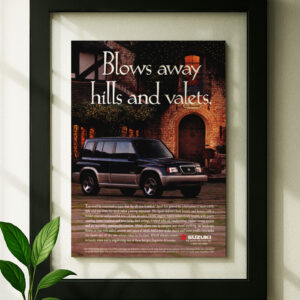 suzuki sidekick framed original ad in black floating frame on wall