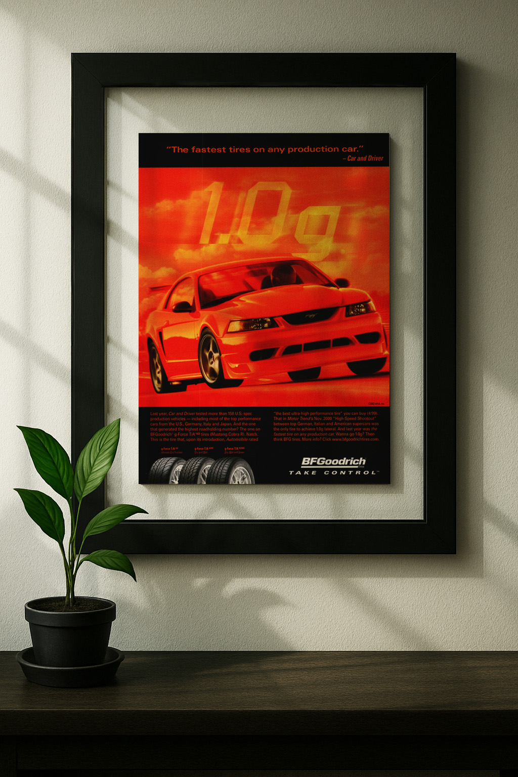 sn95 red mustang original ad in floating frame on wall