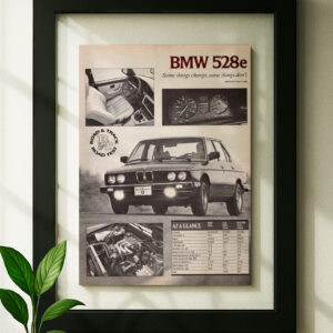 bmw e28 528e framed original ad in black floating frame on wall