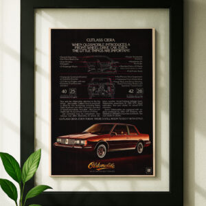 oldsmobile cutlass ciera framed original ad in black floating frame on wall