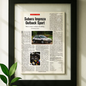 Subaru Impreza Outback Sport framed original ad in black floating frame on wall