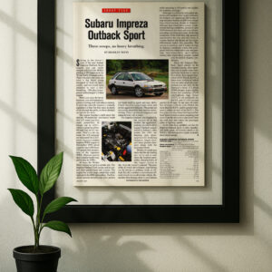 Subaru Impreza Outback Sport framed original ad in black floating frame on wall